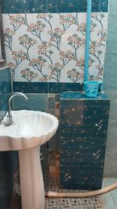 Phòng tắm tại OM Palace Guest House-Fully Air Conditioned