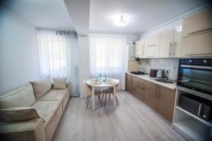 Kuchyň nebo kuchyňský kout v ubytování Orchid Apartment