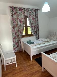 Katil atau katil-katil dalam bilik di Dorgo House