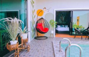 Ruang duduk di Jasmine private poolvilla