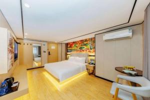 Letto o letti in una camera di Yimimi Apartment - Guangzhou 13th Line Yide Road Metro Station