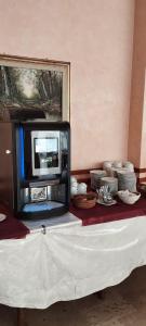 TV a/nebo společenská místnost v ubytování Hotel Acerboli