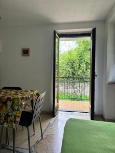 Ένα ή περισσότερα κρεβάτια σε δωμάτιο στο CASA CON VISTA A GRAVERE