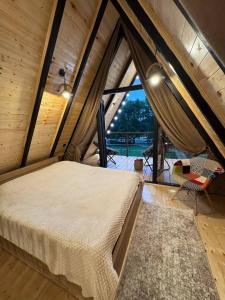 Ένα ή περισσότερα κρεβάτια σε δωμάτιο στο Oda to Didvela -ოდა დიდველაში +58 φωτογραφίες