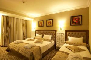 Postel nebo postele na pokoji v ubytování Safran Thermal Resort Sandikli