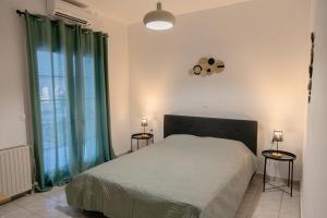 Ένα ή περισσότερα κρεβάτια σε δωμάτιο στο Villa Lemona