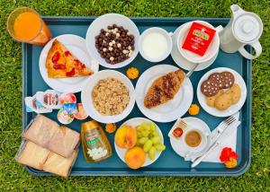 a blue tray filled with different types of food at Il Podere in Trani