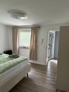 Postel nebo postele na pokoji v ubytování Deluxe Apartment JL mit Terrasse