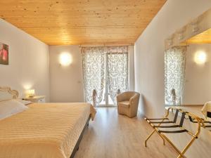 Ένα ή περισσότερα κρεβάτια σε δωμάτιο στο Agriturismo Monte Oliveto +46 φωτογραφίες