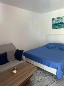 Postel nebo postele na pokoji v ubytování Studio Saturn SunRise