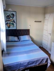 a bedroom with a large bed in a room at Belém Cop 30 in Belém