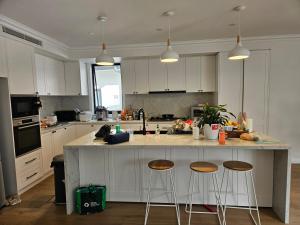 Kuchyň nebo kuchyňský kout v ubytování Chatswood West