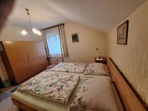 Postel nebo postele na pokoji v ubytování Haus Pilz