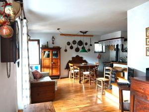 Kuchyň nebo kuchyňský kout v ubytování Casa Rosetta nel cuore delle Dolomiti