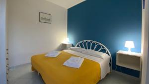 Giường trong phòng chung tại CannetoMare +131 ảnh