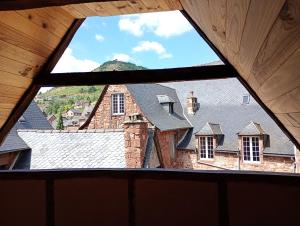 a view from a window of a house at Gîte Le Mansois in Marcillac-Vallon