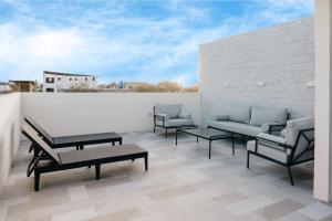 Posezení v ubytování Great Blue Heron Modern Apartment