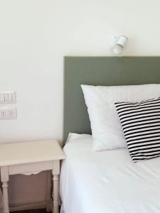 Postel nebo postele na pokoji v ubytování Casa Silvano