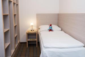 Posteľ alebo postele v izbe v ubytovaní Horský Hotel Dobrá Chata