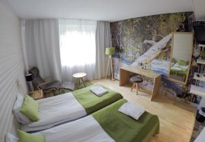 Postel nebo postele na pokoji v ubytování Hotel Ivalo