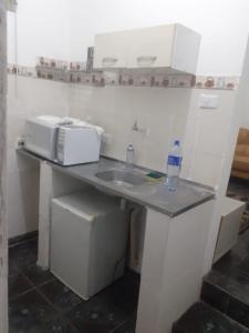 Η κουζίνα ή μικρή κουζίνα στο casa barueri jad dos camargos 5 minutos a pé de alphaville