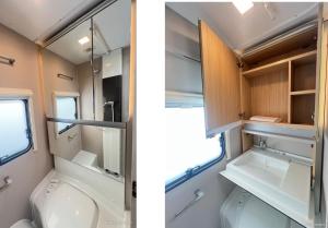 a small bathroom with two sinks and a toilet at Przyczepa ADORA nad morzem in Rumia +5 photos