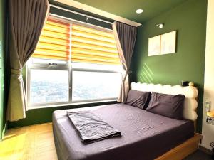 Postel nebo postele na pokoji v ubytování Koala 1BR Apartment w Pool,Gym near Becamex Tower
