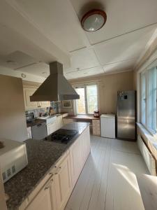 O bucătărie sau chicinetă la 3-Bedroom Apartment