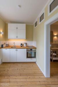 Η κουζίνα ή μικρή κουζίνα στο Apartment Barockgarten