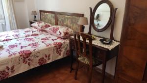 Postel nebo postele na pokoji v ubytování B&B Tou Lì