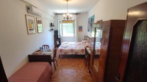 Postel nebo postele na pokoji v ubytování B&B Tou Lì