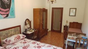 Postel nebo postele na pokoji v ubytování B&B Tou Lì