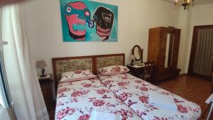 Postel nebo postele na pokoji v ubytování B&B Tou Lì