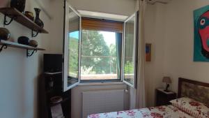 Postel nebo postele na pokoji v ubytování B&B Tou Lì