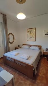Postel nebo postele na pokoji v ubytování B&B Tou Lì