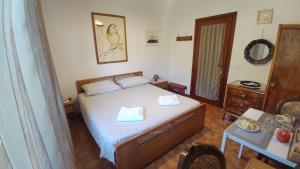 Postel nebo postele na pokoji v ubytování B&B Tou Lì