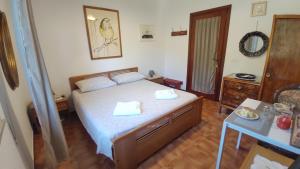Postel nebo postele na pokoji v ubytování B&B Tou Lì