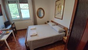 Postel nebo postele na pokoji v ubytování B&B Tou Lì