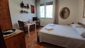 Postel nebo postele na pokoji v ubytování B&B Tou Lì