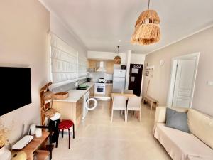 Kuchyň nebo kuchyňský kout v ubytování Boho Beach Apartment