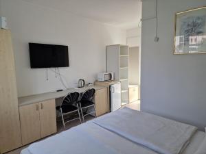 Kuchyň nebo kuchyňský kout v ubytování Lencsés Apartmanház Apartmanok