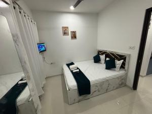 Photo de la galerie de l'établissement Atithi Homes Luxe Kandivali Suites, à Mumbai