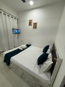 Photo de la galerie de l'établissement Atithi Homes Luxe Kandivali Suites, à Mumbai