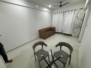 Photo de la galerie de l'établissement Atithi Homes Luxe Kandivali Suites, à Mumbai