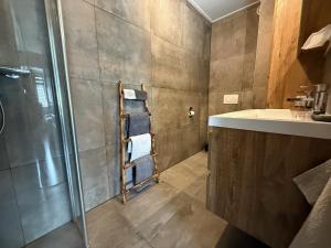 Koupelna v ubytování B&B Pullemans + 10 fotografií
