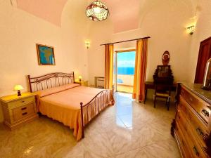 En eller flere senge i et værelse på Vista Vettica