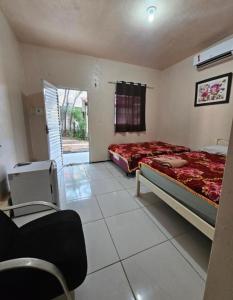 Postel nebo postele na pokoji v ubytování Capitólio 05 Hospedagem em Canoa Quebrada Ce