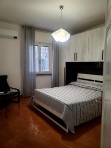 Katil atau katil-katil dalam bilik di Apartament BuBu