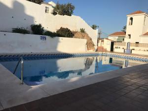 Swimmingpoolen hos eller tæt på The Piano House