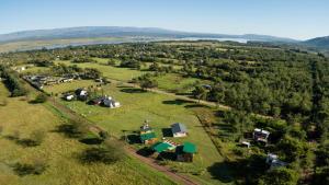 an aerial view of a farm with houses and trees at Mi lugar en el mundo in Villa Ciudad Parque